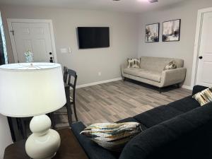 TV a/nebo společenská místnost v ubytování Executive Suite