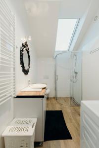 Koupelna v ubytování Apartamenty Tajęcina Lotnisko