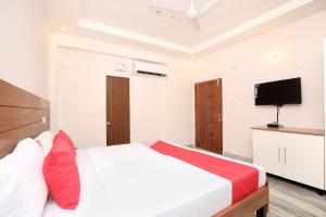 TV a/nebo společenská místnost v ubytování Hotel O The Nest