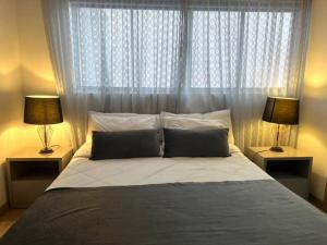 Ένα ή περισσότερα κρεβάτια σε δωμάτιο στο Impecable y lujoso apartamento para una estadía unica +10 φωτογραφίες