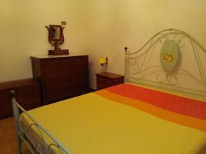 A bed or beds in a room at Residenza Zona Franca