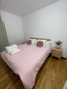 Ένα ή περισσότερα κρεβάτια σε δωμάτιο στο Casa acogedora golf Rioja alta +7 φωτογραφίες