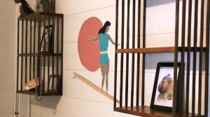 una pared con una foto de una mujer en un estante en Salty Enthusiasts Share House & Villas, en Santa Teresa Beach