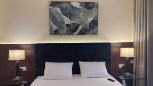 Postel nebo postele na pokoji v ubytování Ajman Executive Stay