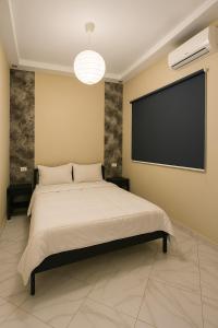 Postel nebo postele na pokoji v ubytování Relax Family 12 - Cozy Entire Apartment in City Center