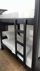 Postel nebo postele na pokoji v ubytování APARTAMENTOS ESTADIO MK REMODELADOS EN LA MEJOR ZONA DE MEDELLIiN