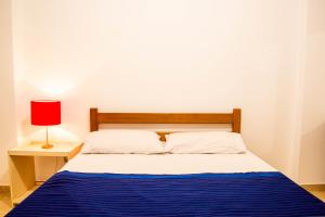 Postel nebo postele na pokoji v ubytování Xango 103 - Ótima Localização 100m da praia