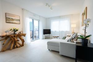 Μια τηλεόραση ή/και κέντρο ψυχαγωγίας στο Alpen Apartment Chiemsee