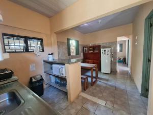 Η κουζίνα ή μικρή κουζίνα στο MAEVE Hostel +3 φωτογραφίες