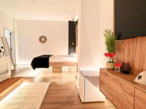 a bedroom with a bed in a room at Jacuzzi Studio Room in Shkodër