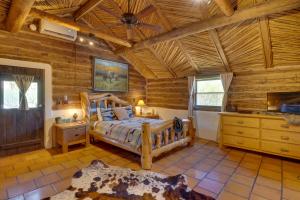 a bedroom with a bed and a wooden ceiling at Unwind Poolside, Scenic Sonoran Desert Retreat! in Tucson +17 photos