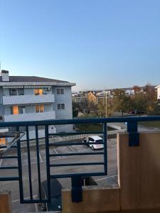 a view of a parking lot from a balcony at Calvo in Ronchi dei Legionari