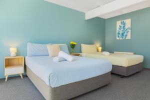 Postel nebo postele na pokoji v ubytování Coast Motel Eden