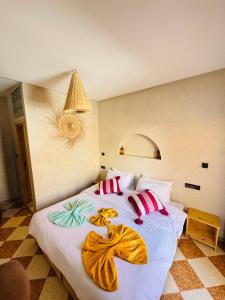 Postel nebo postele na pokoji v ubytování Natural Surf House