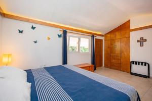 Postel nebo postele na pokoji v ubytování Bamboo Santa María - Alberca&Jacuzzi + 65 fotografií