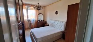 Ένα ή περισσότερα κρεβάτια σε δωμάτιο στο Fiorella's House +18 φωτογραφίες