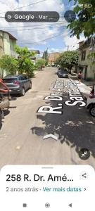 a street with a bunch of parking signs on the road at home in Belém cop 30 in Belém