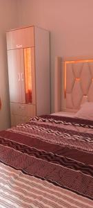 Ένα ή περισσότερα κρεβάτια σε δωμάτιο στο Hospedaje Paraíso