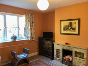 TV a/nebo společenská místnost v ubytování Orchard House