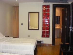 Uma cama ou camas num quarto em Best View Pyramids Hotel