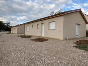 a large building with a lot of windows at Relaxing, quiet, private spa, Besançon in Émagny