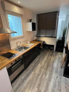 Køkken eller tekøkken på L'escale, proche Bordeaux, parking gratuit