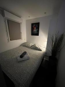 En eller flere senge i et værelse på L'escale, proche Bordeaux, parking gratuit