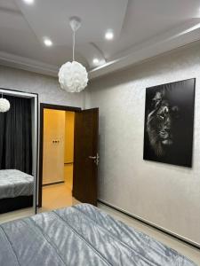 En eller flere senge i et værelse på 3-bedroom apartment