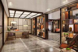 a lobby of a hotel with a table and chairs at Sheraton Kota Kinabalu in Kota Kinabalu +14 photos