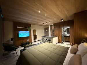 TV a/nebo společenská místnost v ubytování Ap New Time Beira Mar - Castelo B Temporada