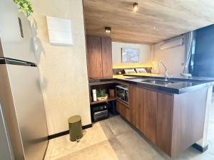 Kuchyň nebo kuchyňský kout v ubytování Ap New Time Beira Mar - Castelo B Temporada