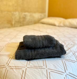 Ένα ή περισσότερα κρεβάτια σε δωμάτιο στο Saphir Apartment 2 rooms Senlis Centre Parc Astérix