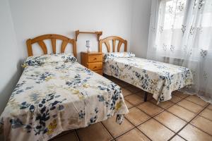 Postel nebo postele na pokoji v ubytování Cal Sopas