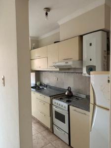 Nhà bếp/bếp nhỏ tại 1ro de Mayo hermoso depto céntrico