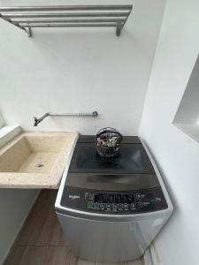 Η κουζίνα ή μικρή κουζίνα στο Apartment with pool in the heart of Bayahibe +15 φωτογραφίες