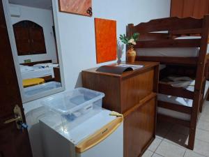 a bathroom with a sink and a bunk bed at Suite aconchegante do Tapana in Belém +131 photos