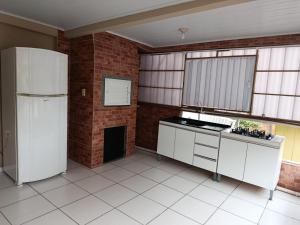 Kuchyň nebo kuchyňský kout v ubytování Meia agua