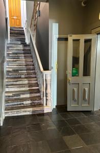 a staircase in a building with a door at Echuca Hotel in Echuca