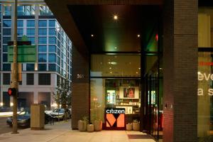 a building with a sign on the front of it at citizenM Los Angeles Downtown in Los Angeles
