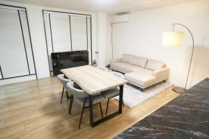 Et opholdsområde på Guest house ENJOY