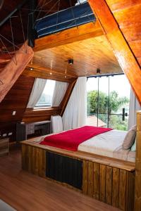 Postel nebo postele na pokoji v ubytování Chalé Bela Vista Montanha Capivari