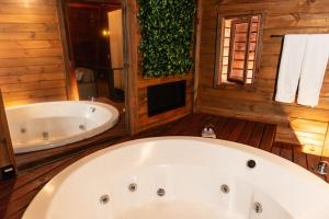 Koupelna v ubytování Chalé Bela Vista Montanha Capivari + 52 fotografií