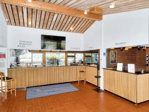 a restaurant with a counter in a room at 6 person holiday home in Gilleleje in Gilleleje