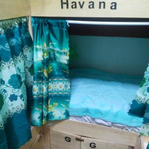 Ένα ή περισσότερα κρεβάτια σε δωμάτιο στο The World