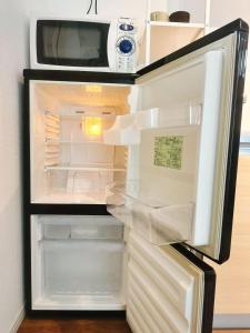 Η κουζίνα ή μικρή κουζίνα στο Linn 阿倍野