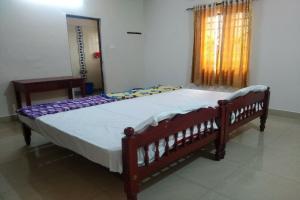Gallery image of SPOT ON Sana Tourist Home in Kollam