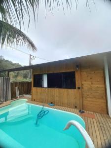 Bazén v ubytování SuÍte MAR Espaço Kombucha Para-ty nebo v jeho okolí