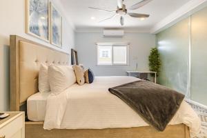a bedroom with a large bed with a ceiling fan at Dream Diamond in Saint Annʼs Bay +123 photos