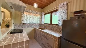 Una cocina o zona de cocina en Rosa del Sol: Entire Private Villa with Pool