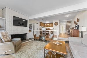a living room with a couch and a table at TKC0693- Keys Dream townhouse in South Lake Tahoe
